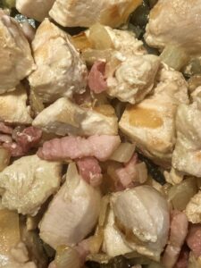 Browning the meat for dairy-free cajun chicken and rice